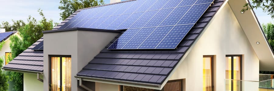 Solar panels on top of a villa rooftop