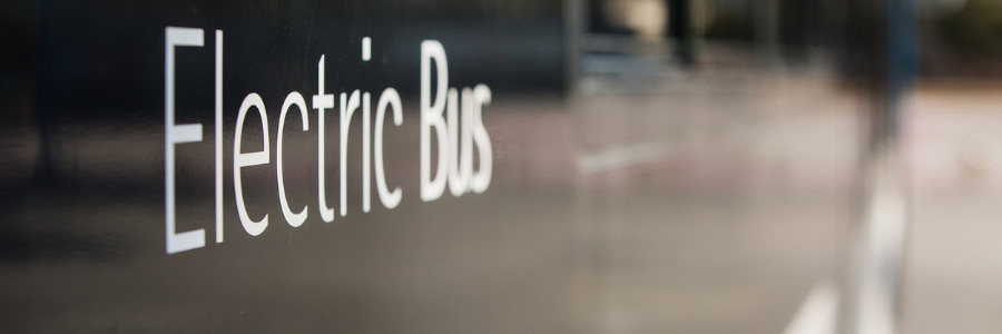 Electric bus writte in white letters on a black background